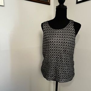 Chico’s black and silver top with black liner.